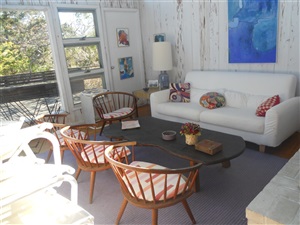 Couch and chairs in sunroom